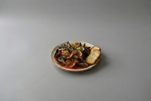 Oysters in red sauce